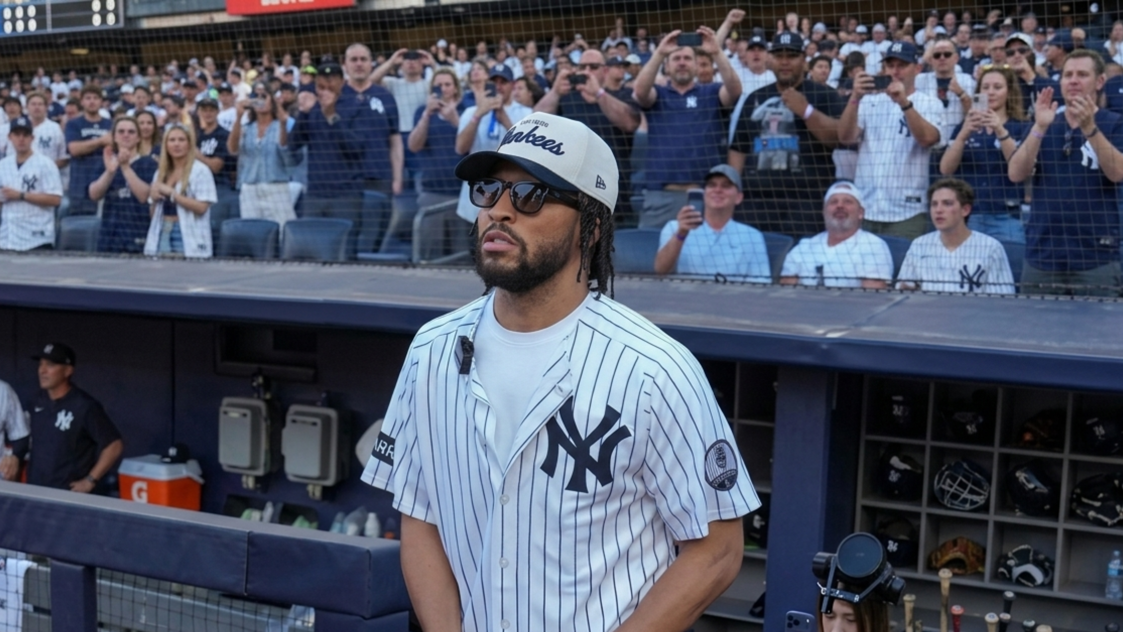 Jalen Brunson New York Yankees 2026 jersey white pinstripe baseball shirt with navy NY logo and commemorative sleeve patches styled as streetwear